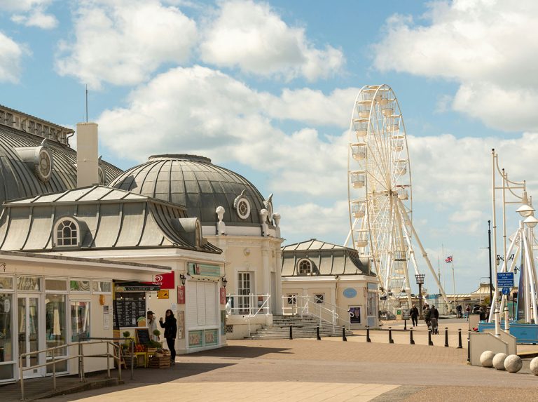 Worthing seafront with a ferris wheel in the background